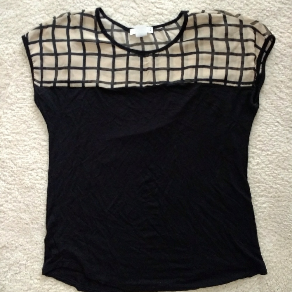 Tan and black top